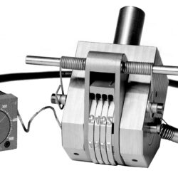 The Model 250P, featuring optional hot stamping equipment and proportional temperature control. The hot stamping equipment includes a heating element in the wheel shaft and unique design features not found in cold stamping heads.