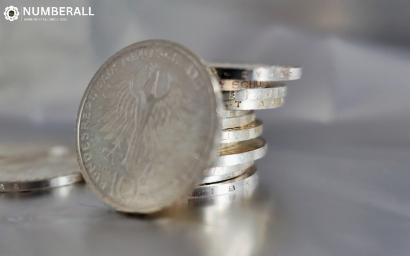 Marking Coin Edges with Numberall Machines